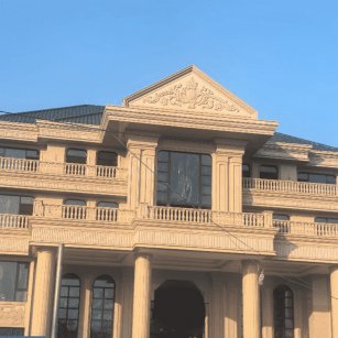 黑龙江黄金麻别墅外墙干挂石材效果示例