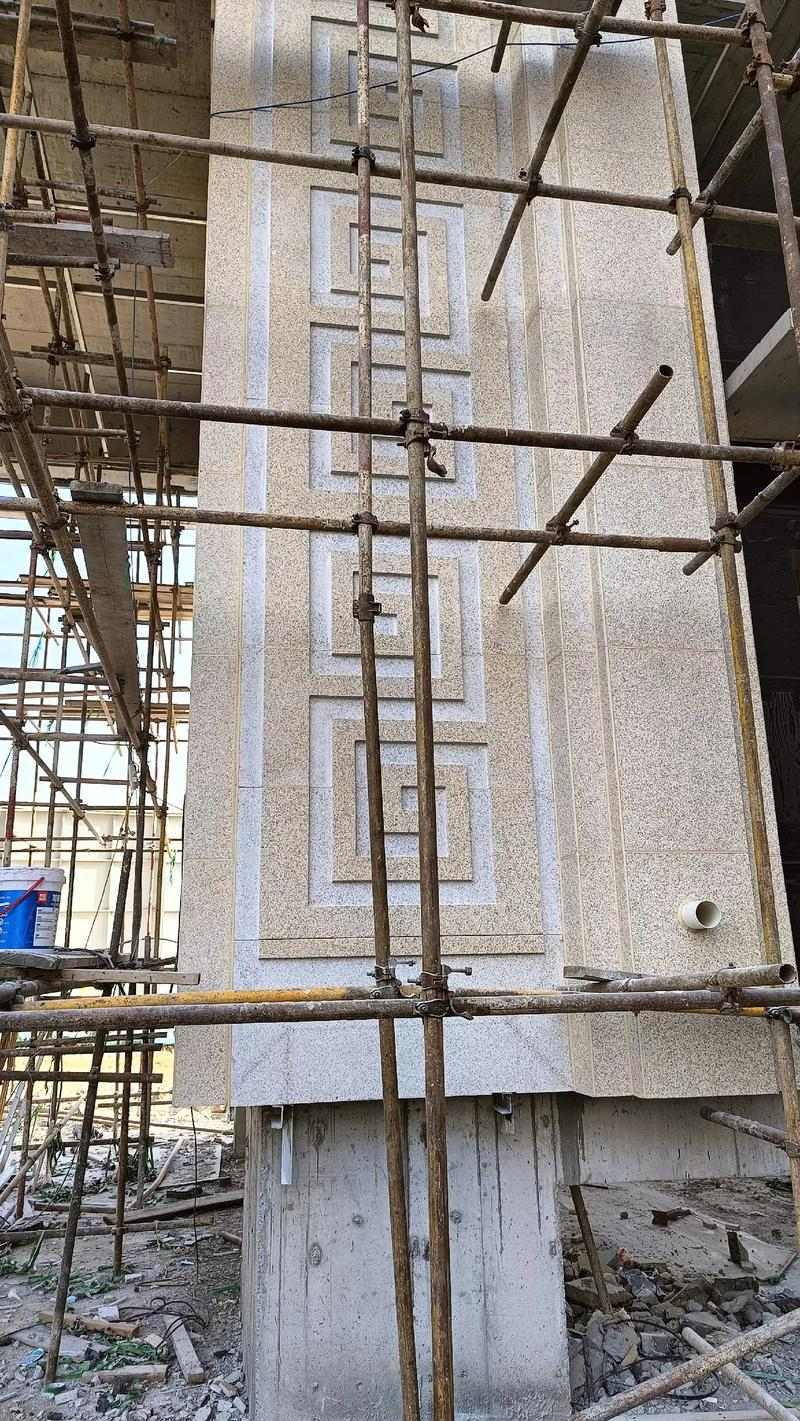 黑龙江 黄金麻花岗岩别墅外墙干挂回纹造型效果