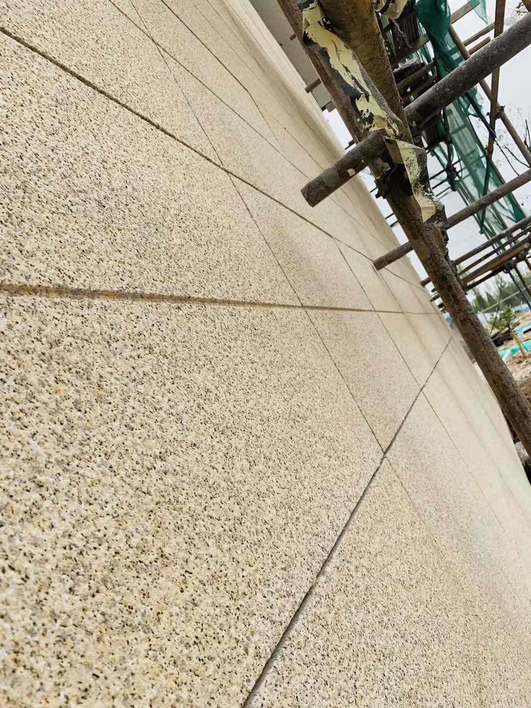 黑龙江 黄金麻花岗岩荔枝面外墙干挂石材效果示例